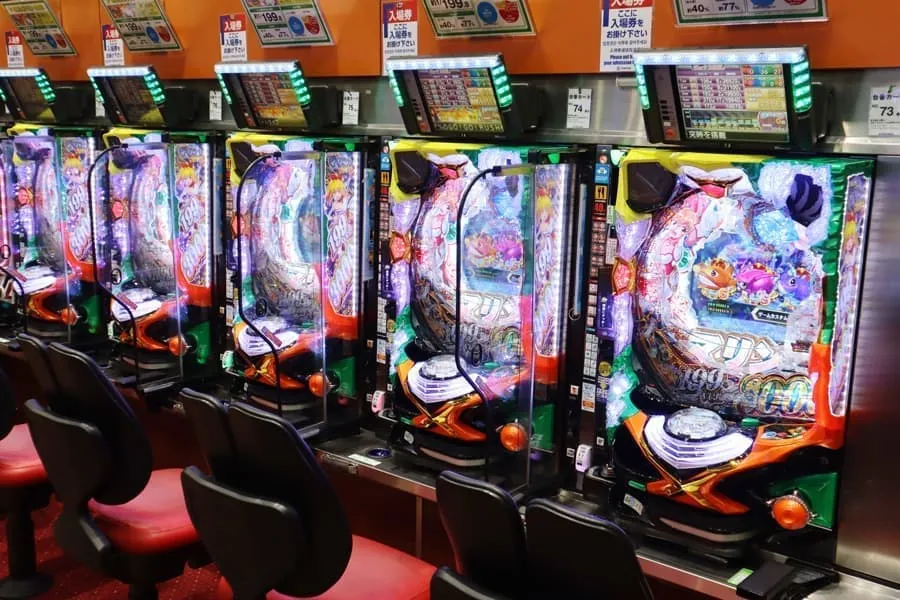 Pachinko machine close-up showing steel balls and pins